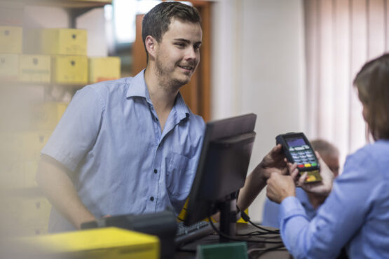 customer using credit card reader at store 2022 03 08 01 34 54 utc customer using credit card reader at store 2022 03 08 01 34 54 utc