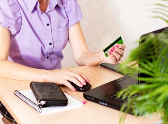 hands of a middle aged woman holding a credit card 2022 02 16 03 42 11 utc 1 hands of a middle aged woman holding a credit card 2022 02 16 03 42 11 utc 1