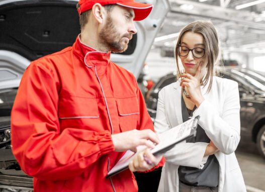 sad woman client with auto mechanic at the car ser 2021 11 12 23 07 41 utc sad woman client with auto mechanic at the car ser 2021 11 12 23 07 41 utc