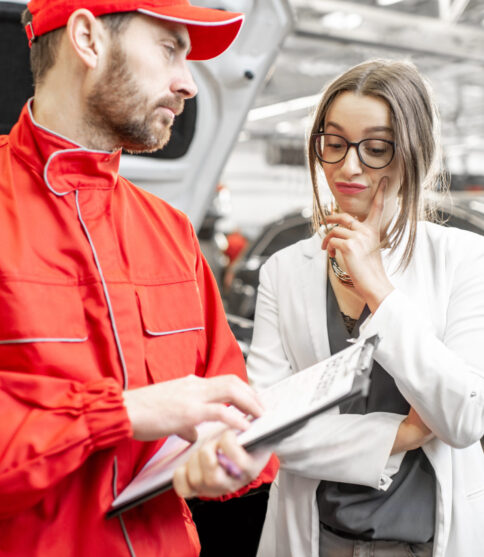 sad woman client with auto mechanic at the car ser 2021 11 12 23 07 41 utc sad woman client with auto mechanic at the car ser 2021 11 12 23 07 41 utc